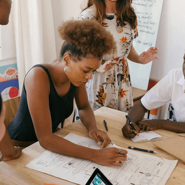 Team collaborating around a table